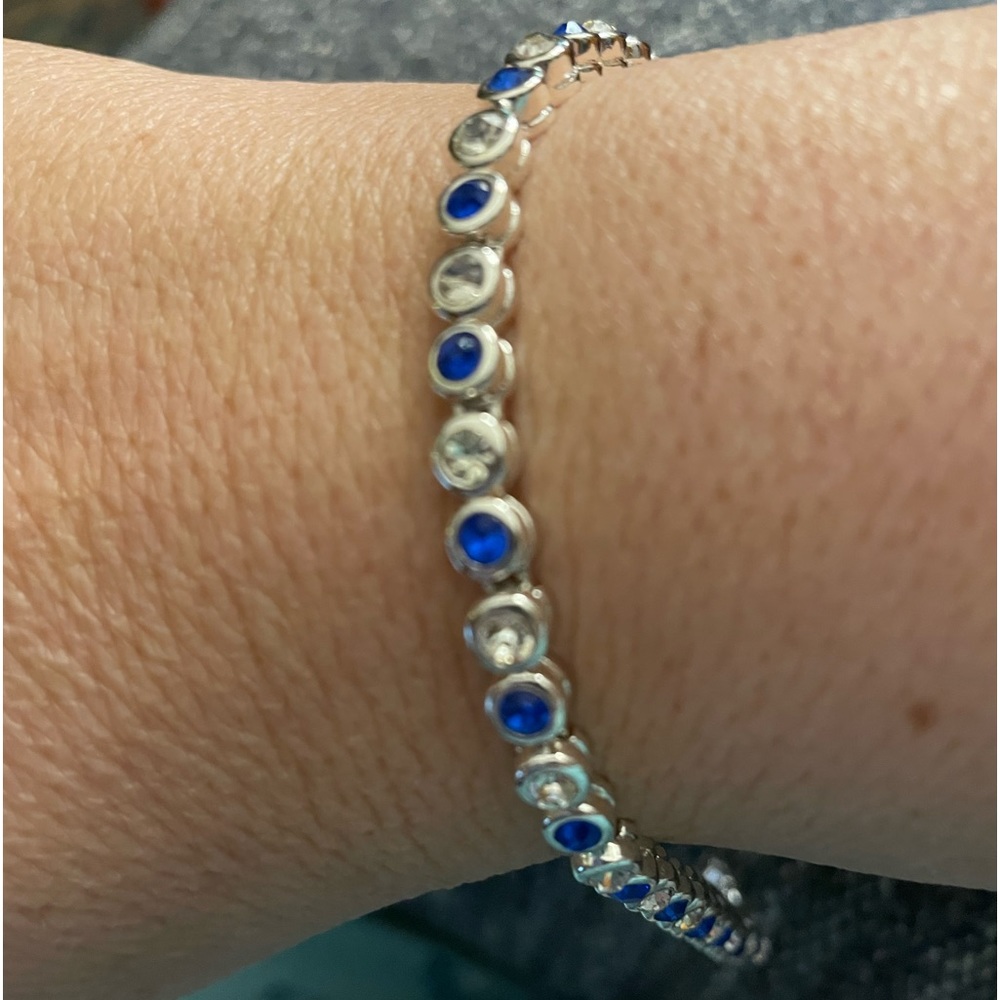 Bracelets and matching earrings.  New, still in the AVON box.
